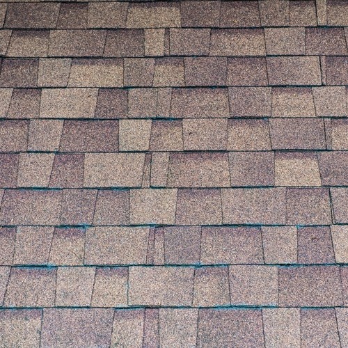 view from above of a brown shingle roof